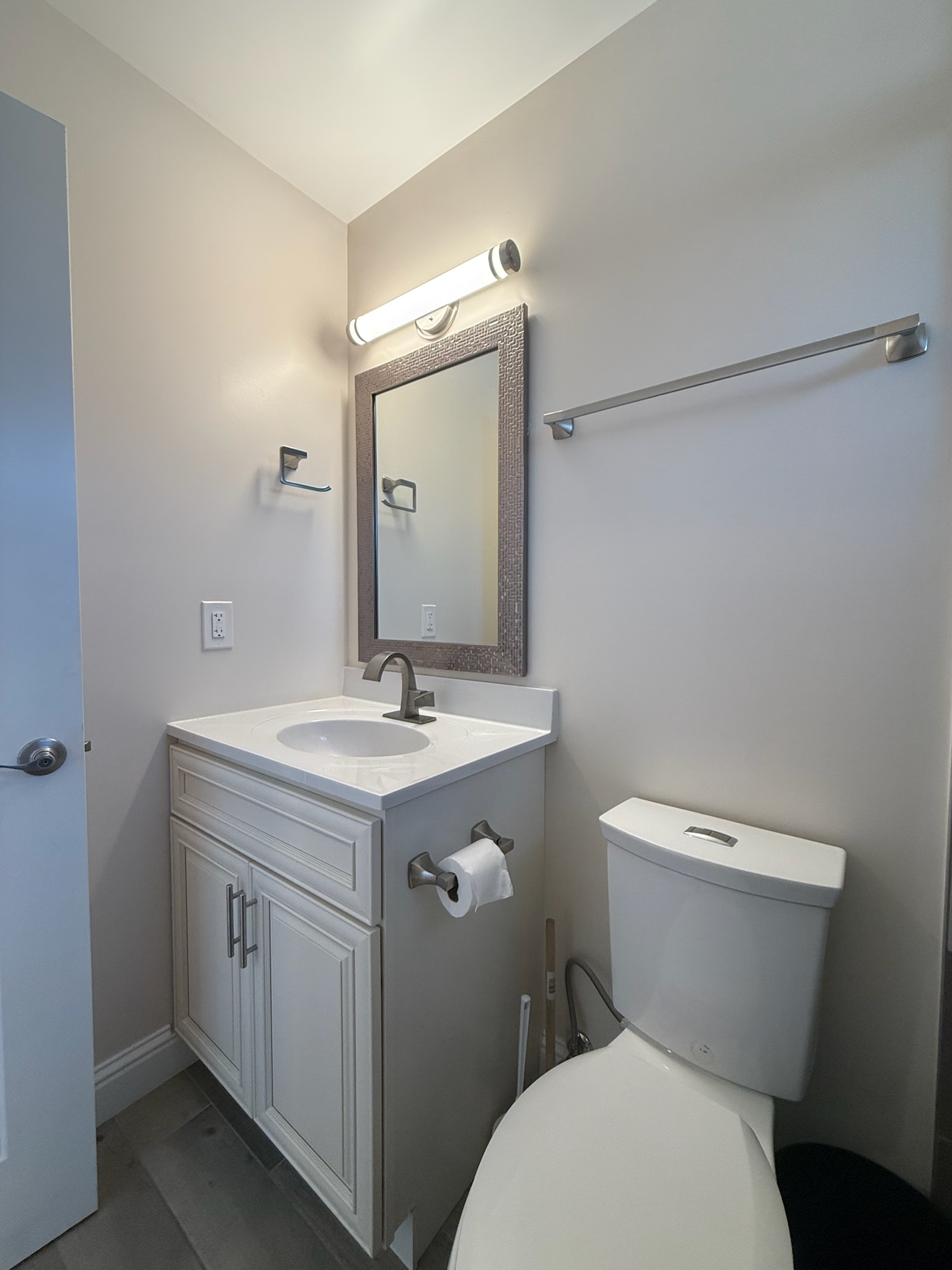 Bathroom vanity and toilet